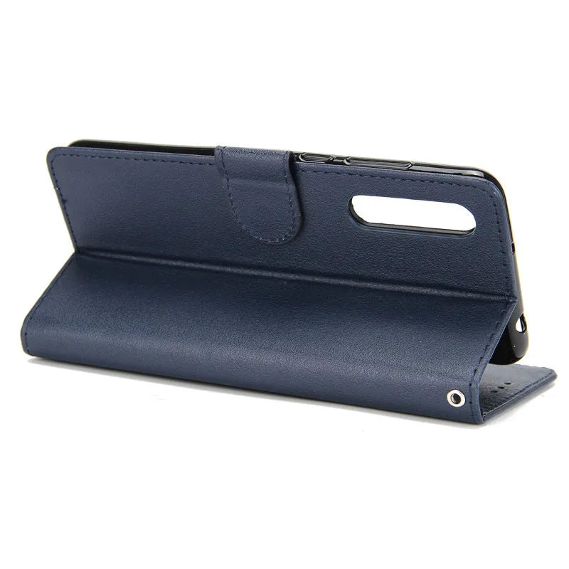 Flip wallet holder open to show card slots and phone compartment in brown imitation leather