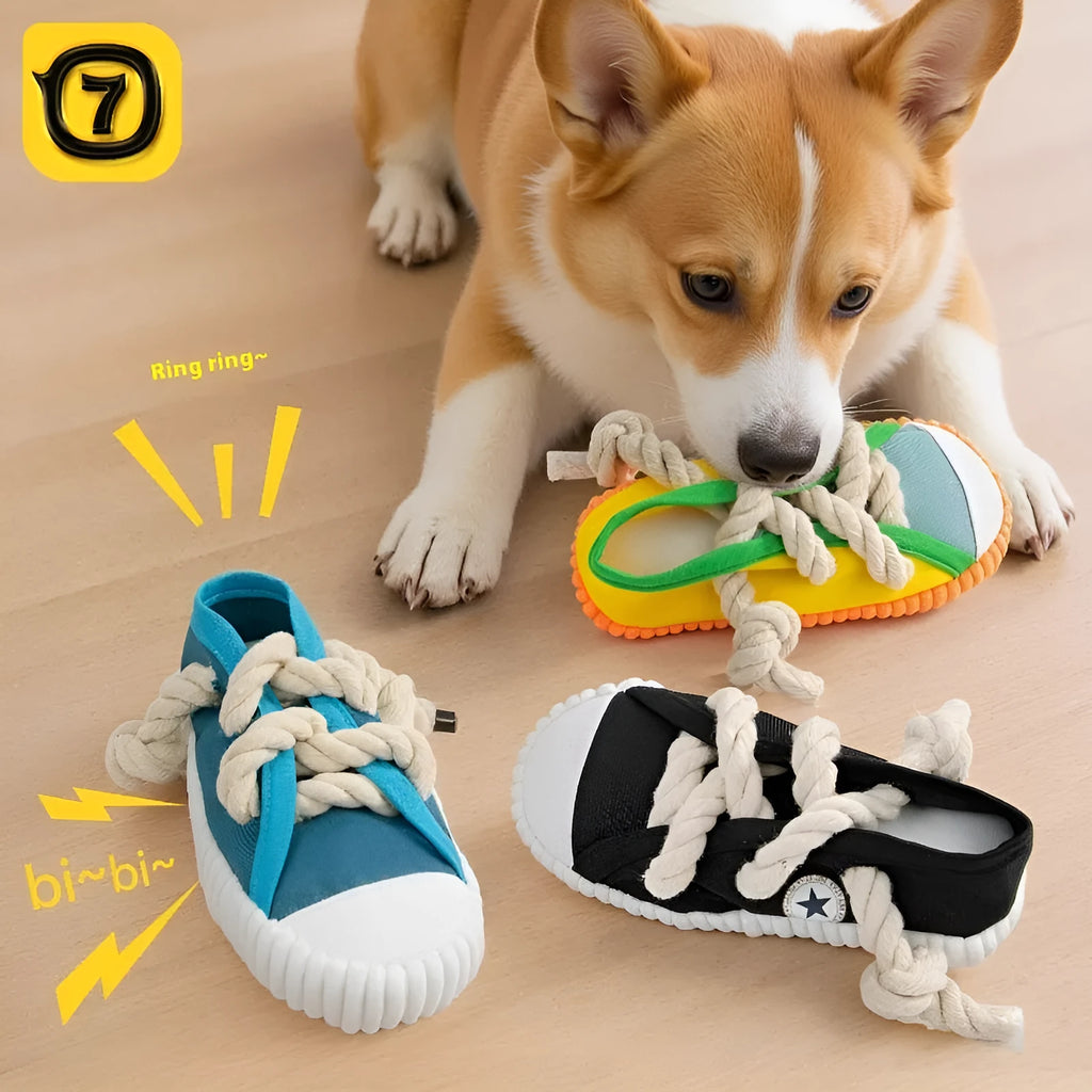 Yellow plastic dog chew toy shaped like slippers, with a sound mechanism for pet play.