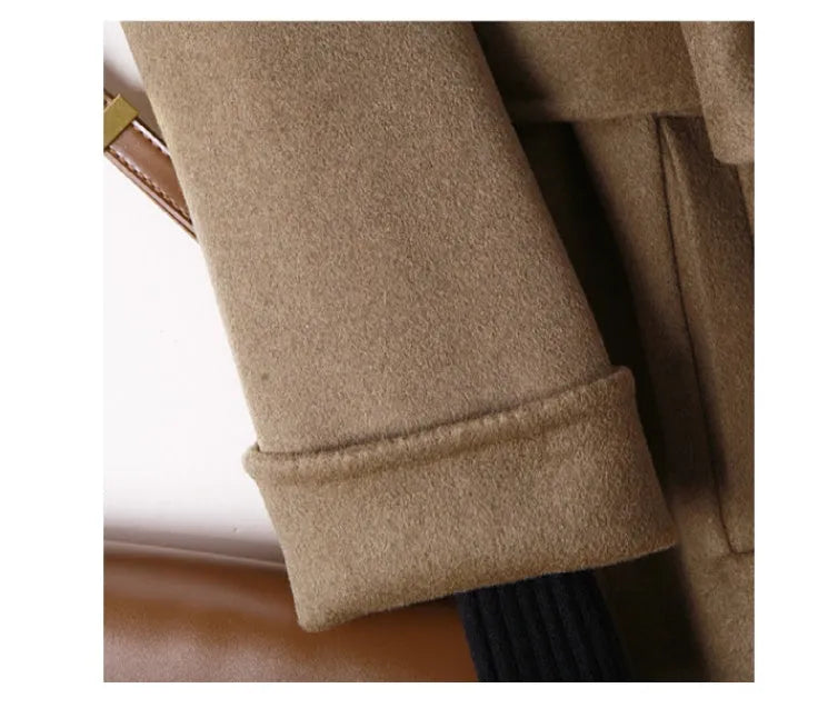 Long wool coat with suit collar in black and caramel colours showing front styling