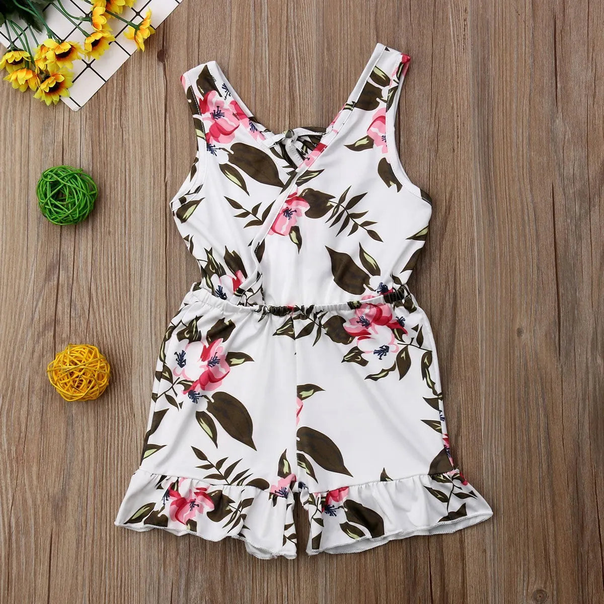 Cotton floral summer outfit for baby girls in white or yellow with sizing from 90cm to 130cm