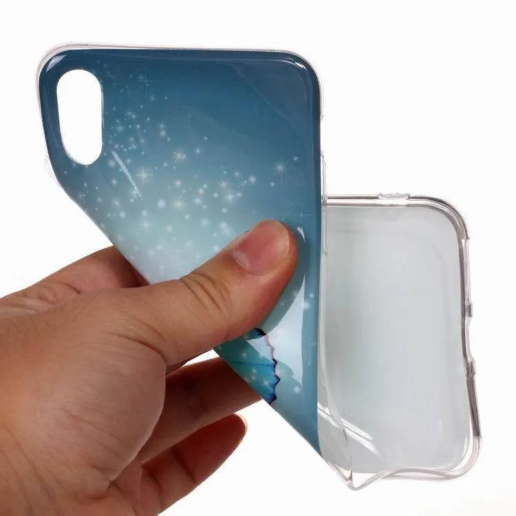 Luminous glow-in-the-dark TPU iPhone case with a cartoon butterfly design on the back.