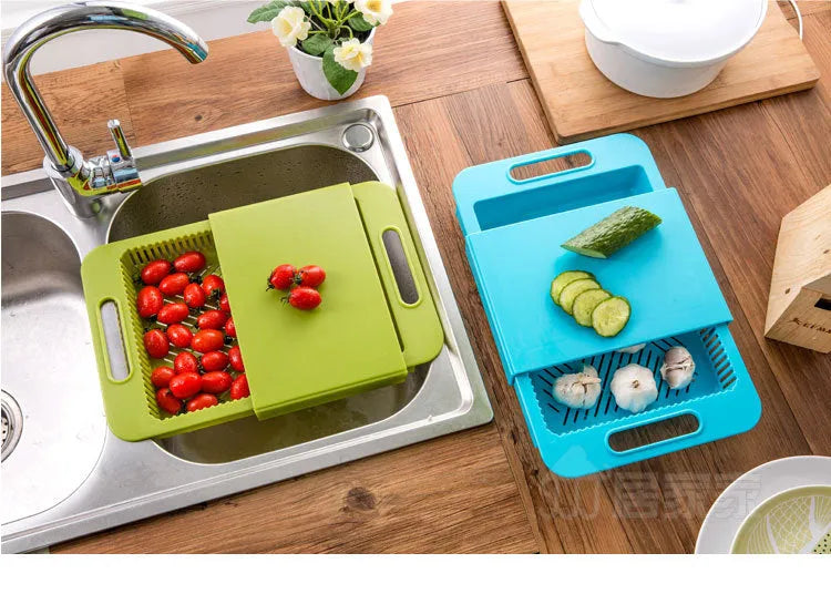 Blue multifunction kitchen chopping board with integrated plastic sink drain basket for vegetable preparation