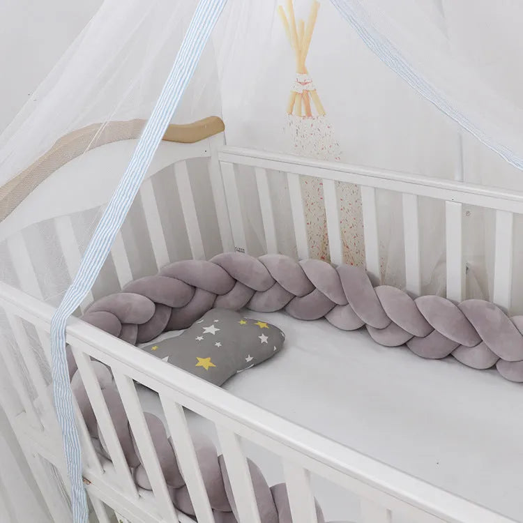 Flexible braided knot baby cot bumper in spandex crystal velvet fabric showing multiple colour options