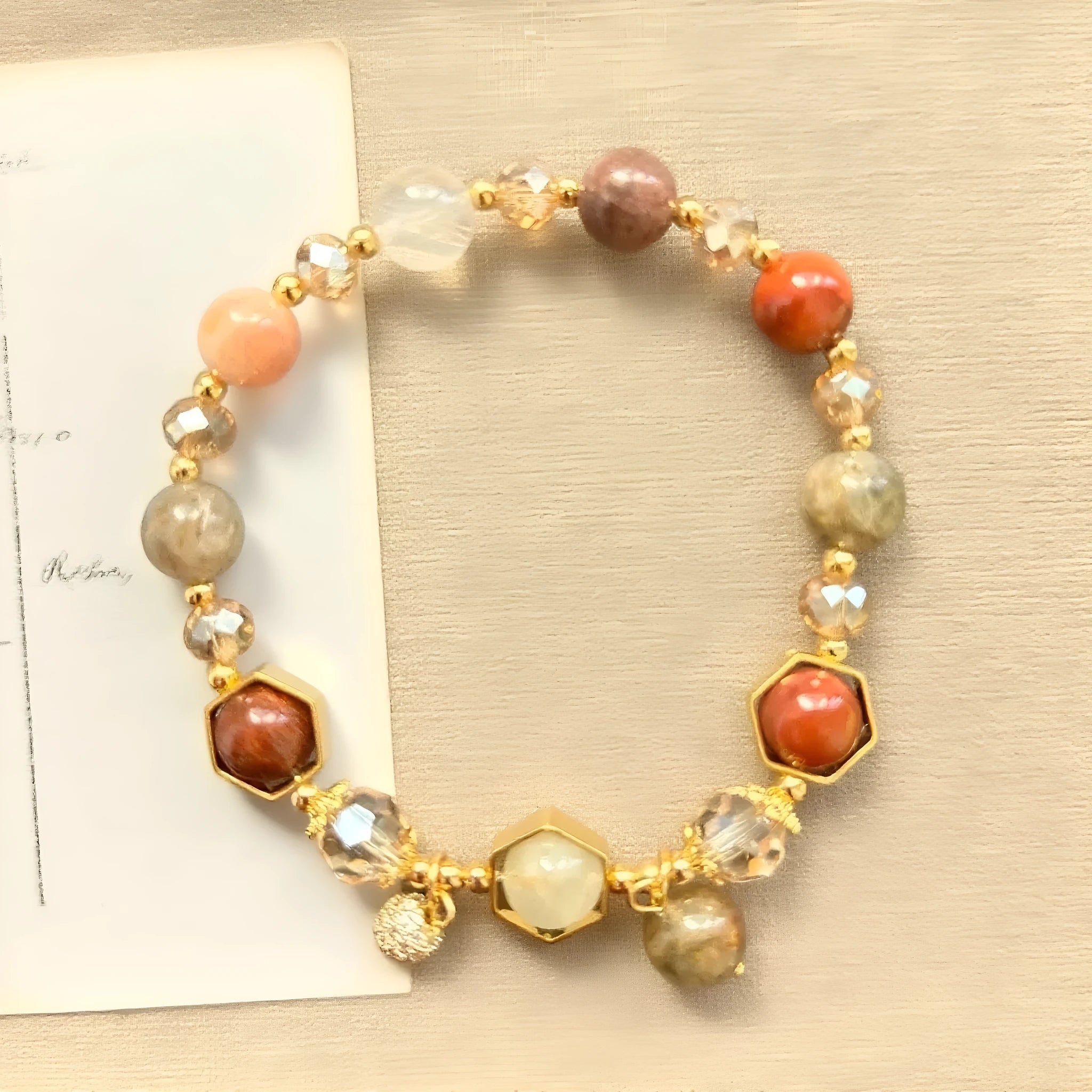 Gold-coloured hand-woven citrine bracelet with auspicious symbols and 8mm beads.
