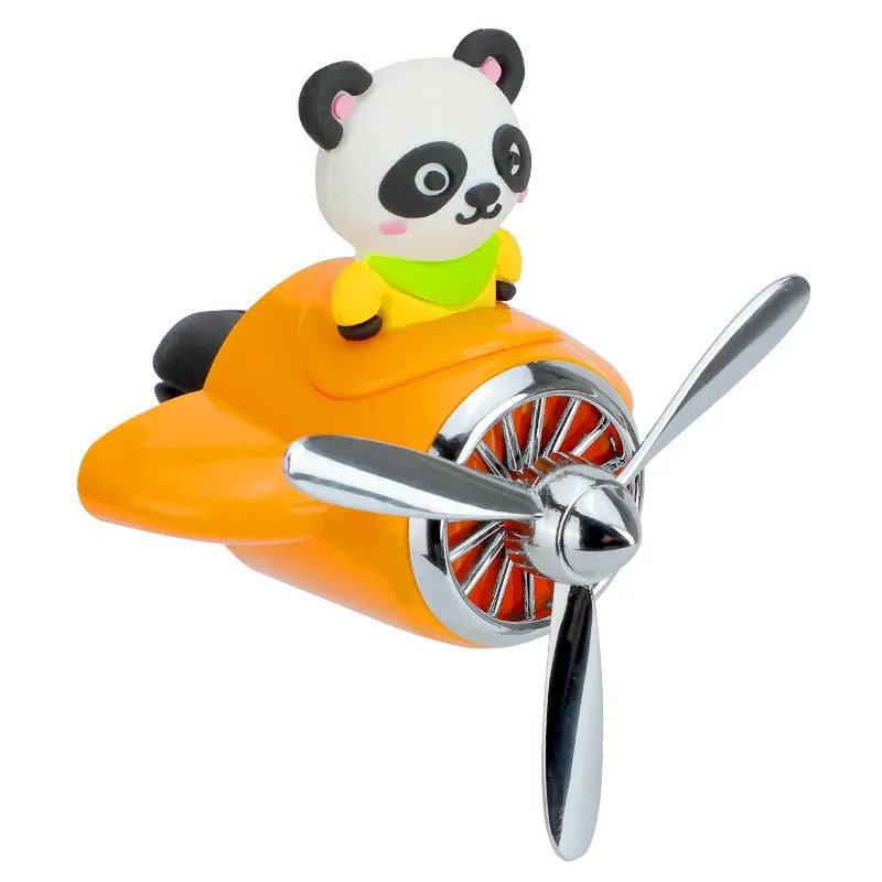 Cartoon aeroplane-shaped plastic car air vent aromatherapy diffuser with fragrant inserts.