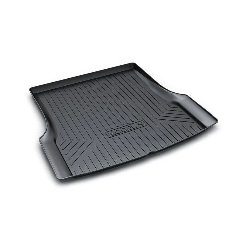 Rubber and TPE floor mat set for a Tesla car interior.