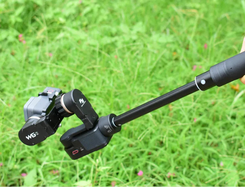Black retractable aluminium selfie stick with Bluetooth remote and phone mount extended