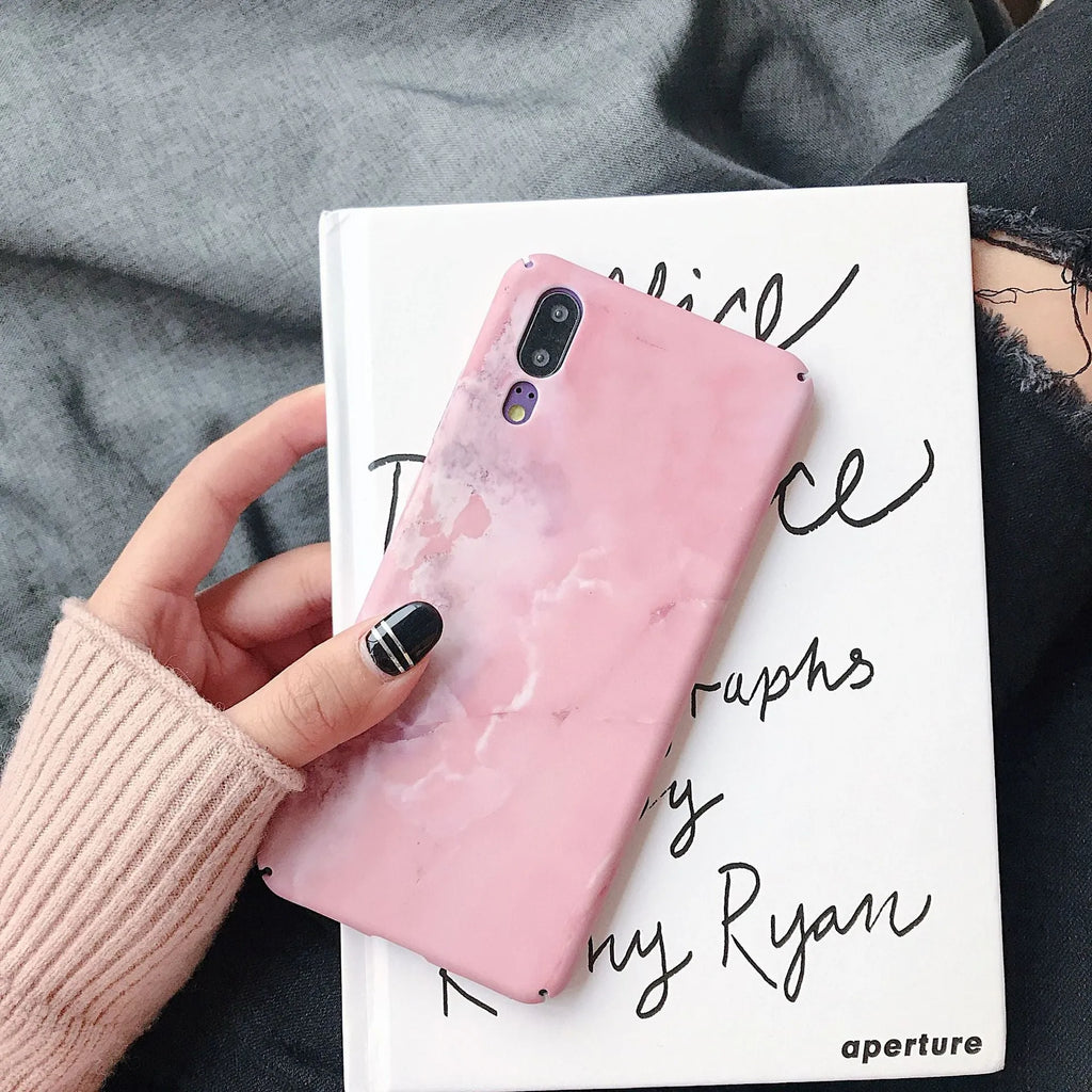 Solid colour painted phone case for Huawei and Honor smartphones in black and pink options.