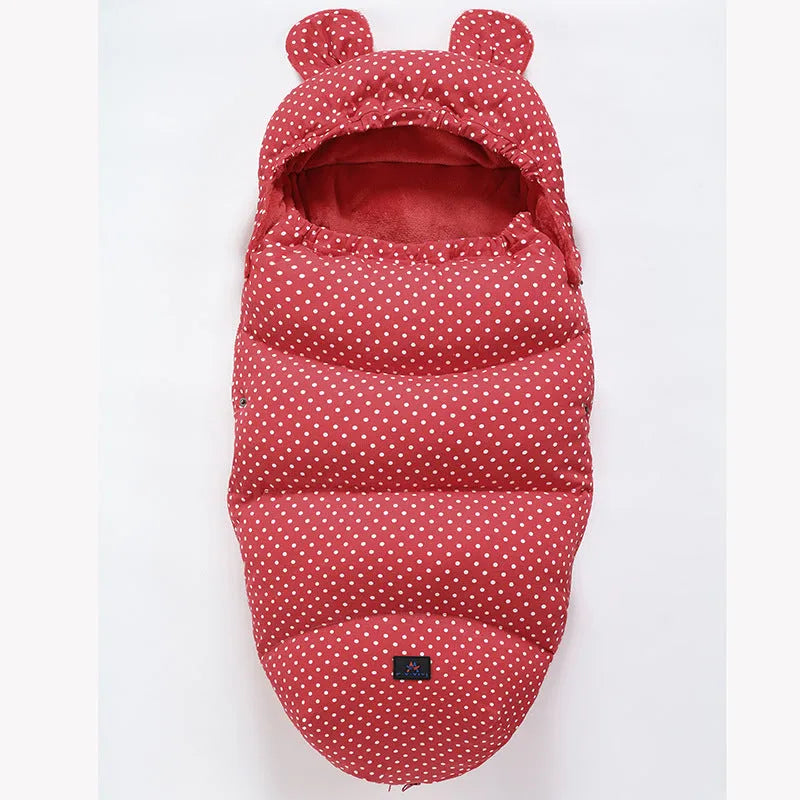 Silkworm cocoon style baby stroller sleeping bag in cotton blend fabric.