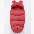 Silkworm cocoon style baby stroller sleeping bag in cotton blend fabric.