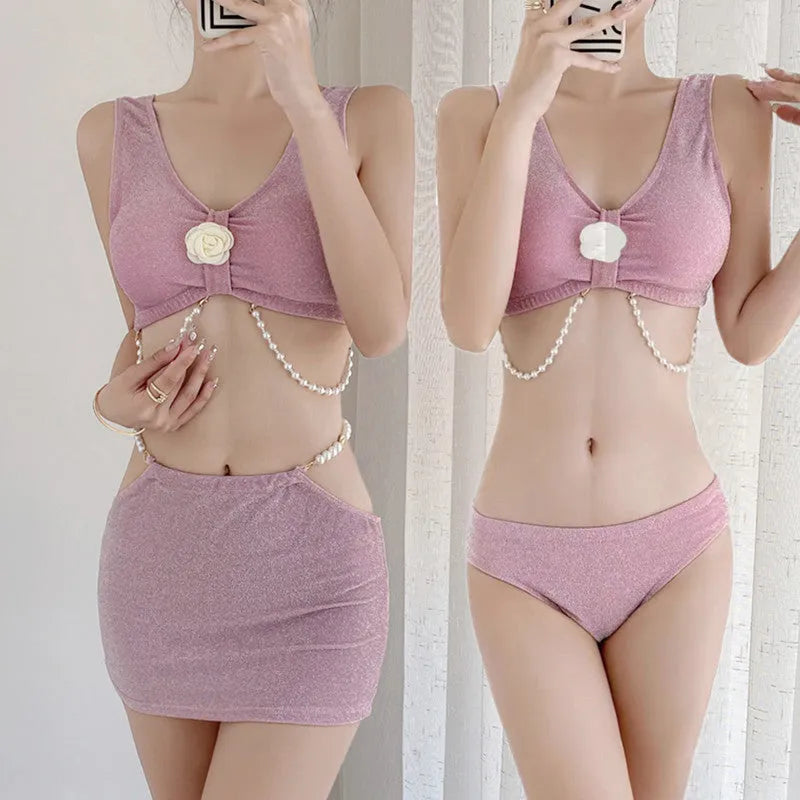 Women's pink and black three-piece polyester bikini for swimming and hot springs.
