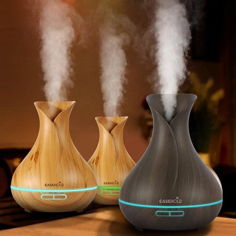 Ultrasonic aroma diffuser with 400ml capacity, dark wood finish, and 7 LED colour light display