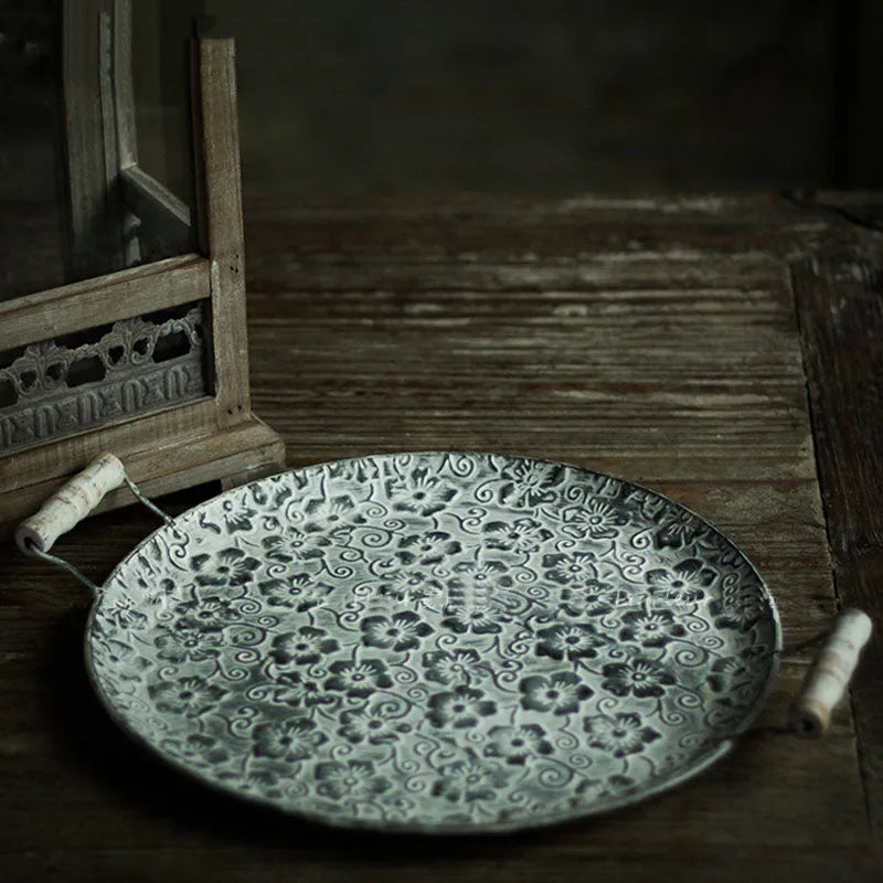 Round European style wrought iron storage tray in two sizes for home organisation.