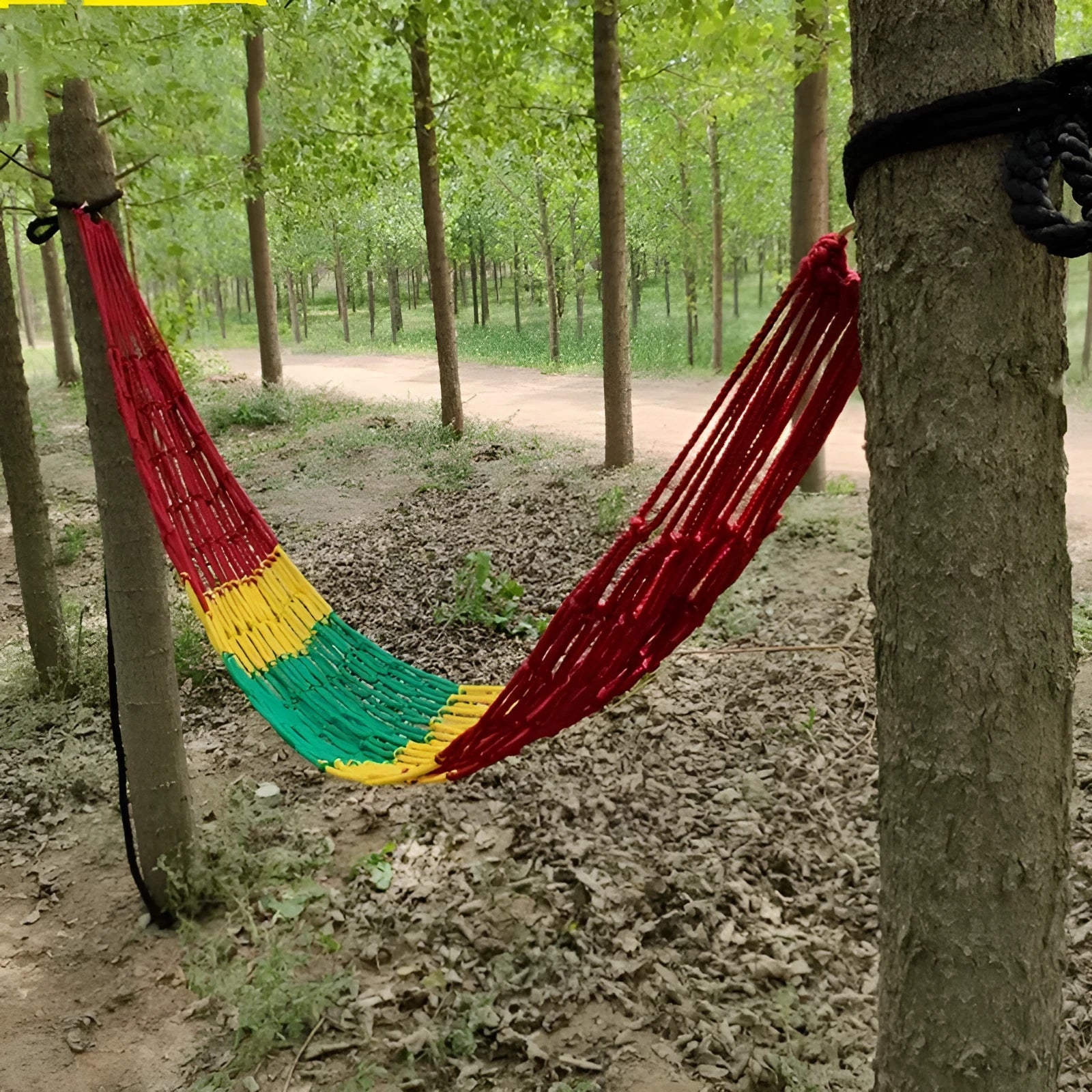 Nylon rope mesh outdoor hammock measuring 1.1m wide with tying components