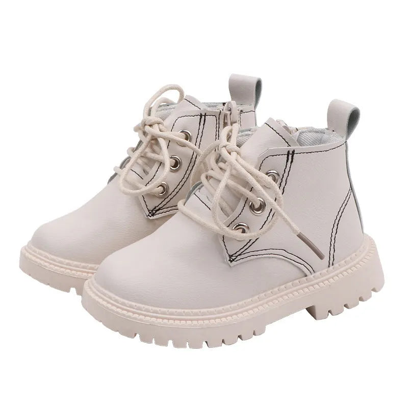 Boys leather short boots with synthetic upper and rubber sole in beige colour, side view