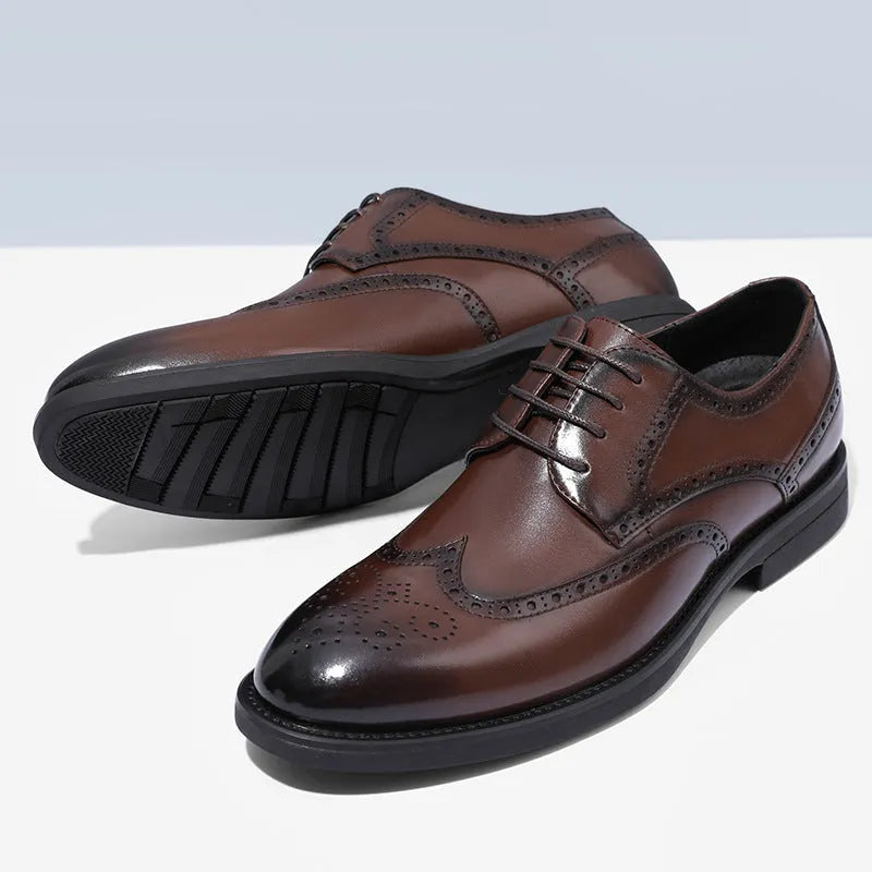 A pair of men's classic black brogue business shoes with a PU leather upper.