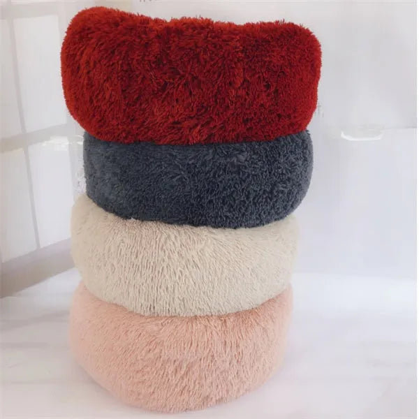 Round long hairy cat bed in plush fabric with anti-slip bottom for autumn and winter