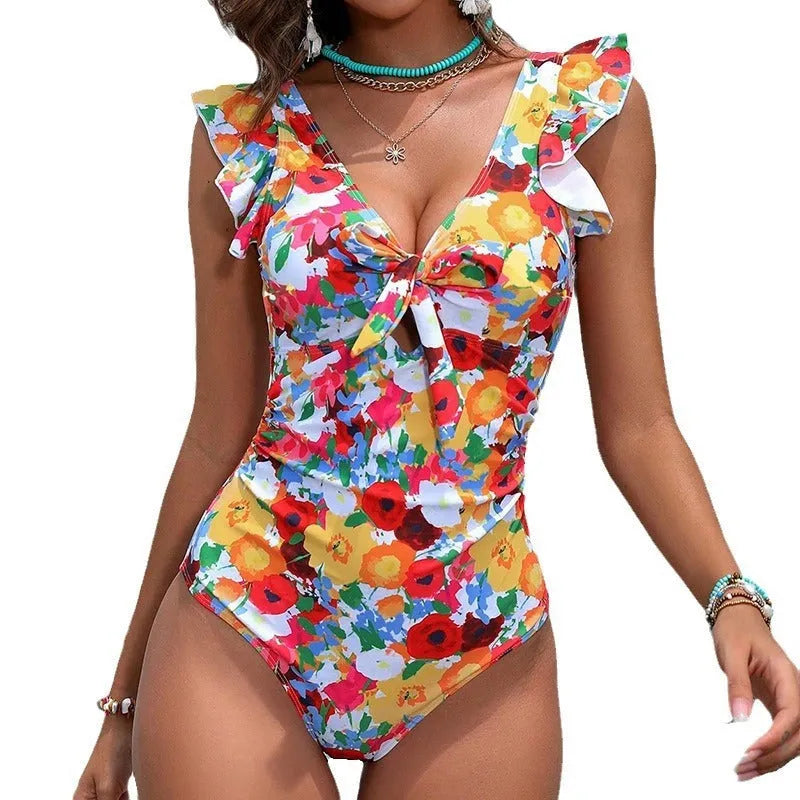 Women's printed one-piece swimsuit in polyester fabric for swimming and hot springs.