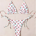 Solid colour split halter bikini top with matching backless briefs on a model