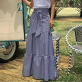 Ruffled hem strappy pleated casual loose skirt in black or blue polyester, sizes S to 3XL.
