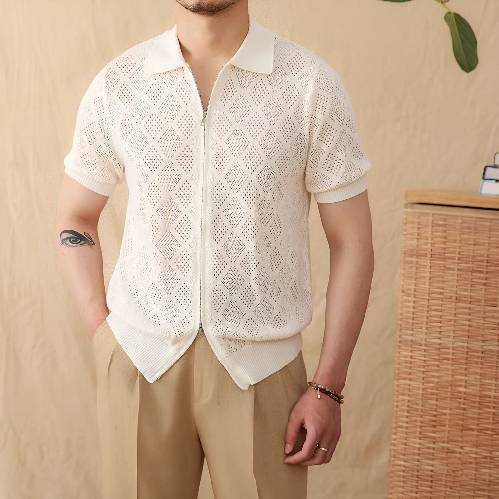 Light brown cotton short sleeve cardigan with zipper front and lapel collar on a hanger.