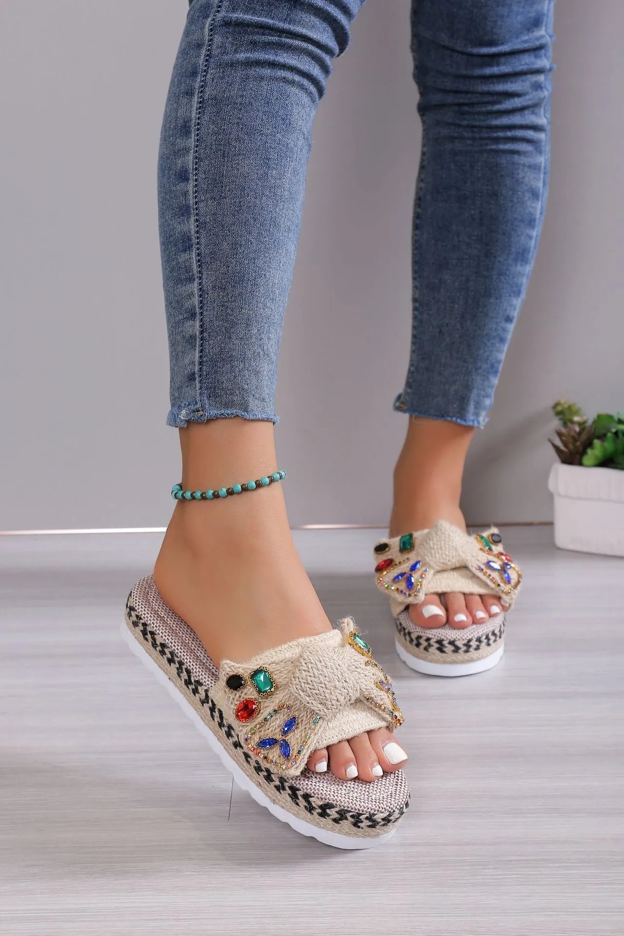 Creamy-white women's platform sandals with a cloth upper, beach bow detail, and a round toe.