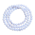 Close-up of a blue striped agate beaded bracelet with Ruyi design on a neutral background.