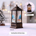 Christmas portable oil lamp with Santa Claus LED design in gold colour on white background