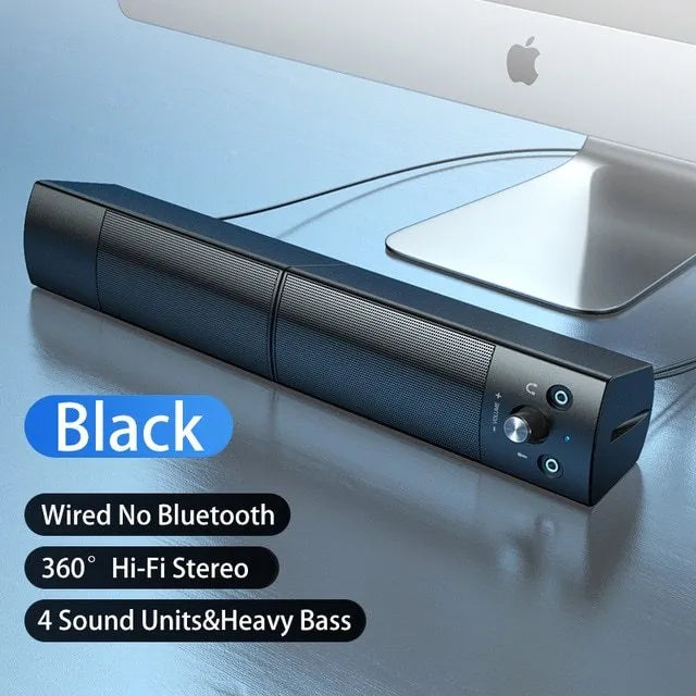 Small phantom black Bluetooth speaker subwoofer with dual speakers and microphone on a desk