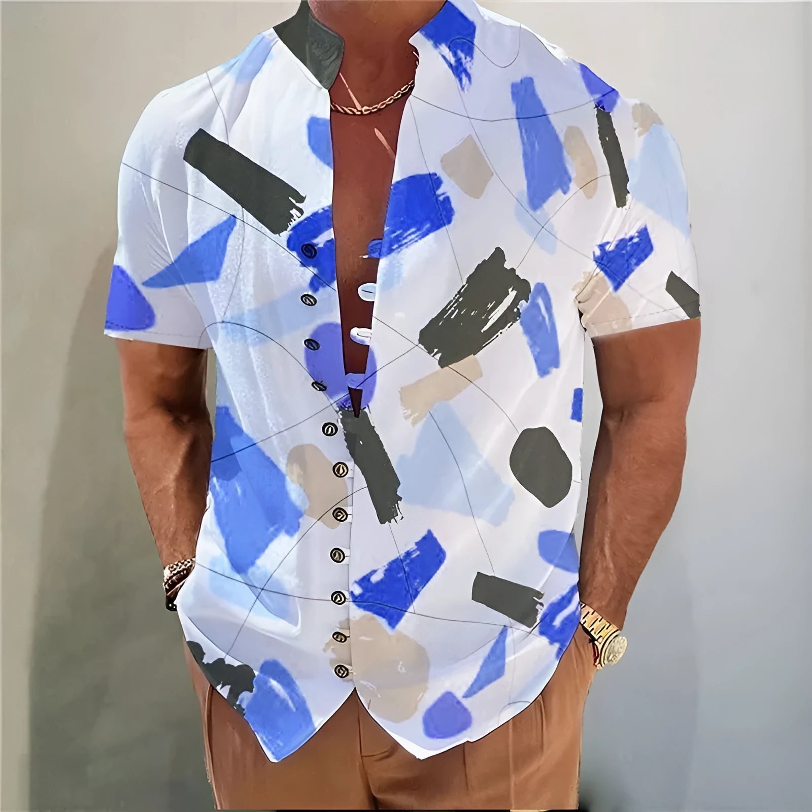 Youth wearing a short sleeve geometric floral print shirt in a cardigan style, available in multiple colours and extended sizes.