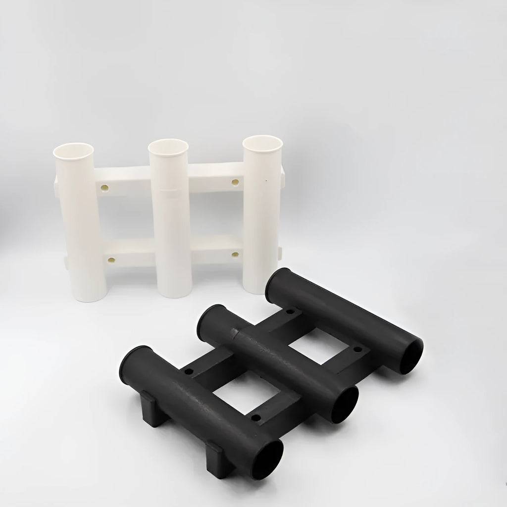 Black or white 3-hole sea fishing rod turret in ABS plastic, 31.5cm x 22.6cm x 6.5cm, with 5cm rod holes.
