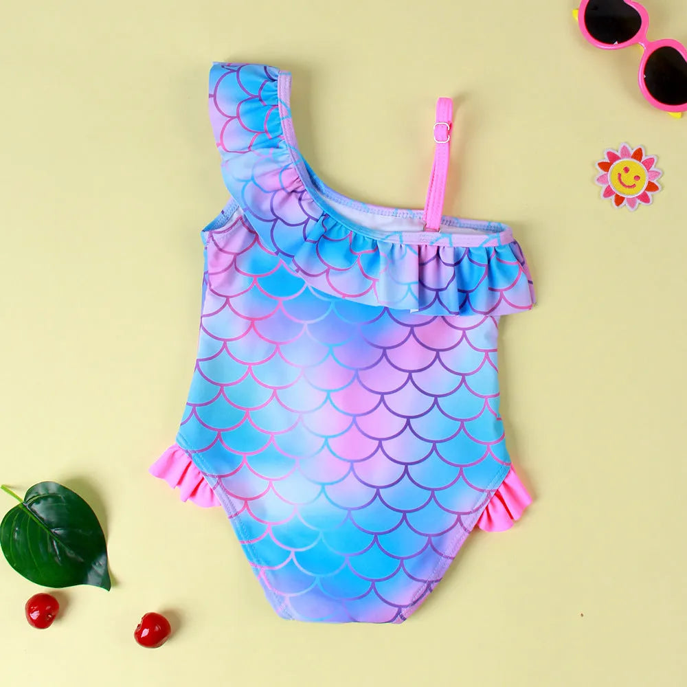 Girls' one-piece swimsuit with scale print and flounced gradient hem in nylon fabric