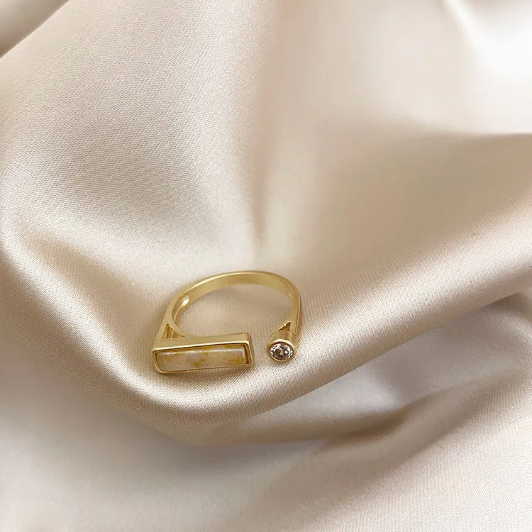 Cream zircon marble ring with true gold plating on a copper base, adjustable opening, retro geometric design