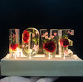 Creative dried flower night light LOVE letter table lamp with wood lampshade, LED warm light, and rose flowers