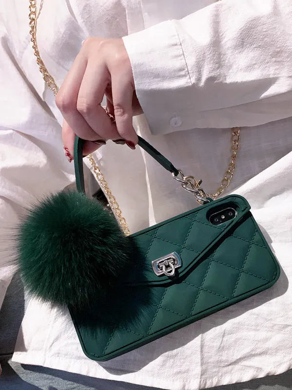 Soft plush hairball phone case with a grid pattern for iPhone, shown in dark green.