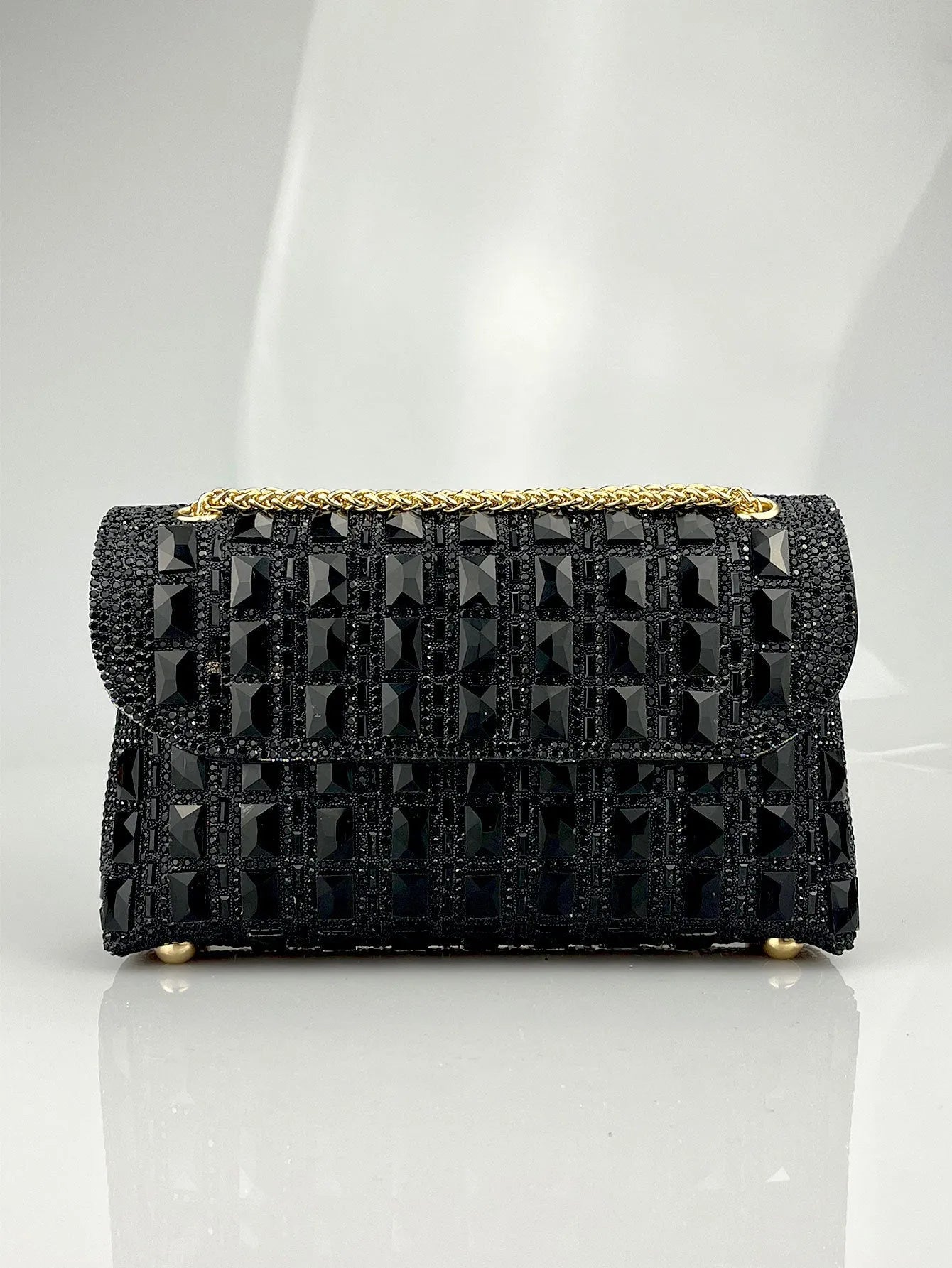 Glass rhinestone chain clutch bag in horizontal square shape with decorative diamonds and chain strap