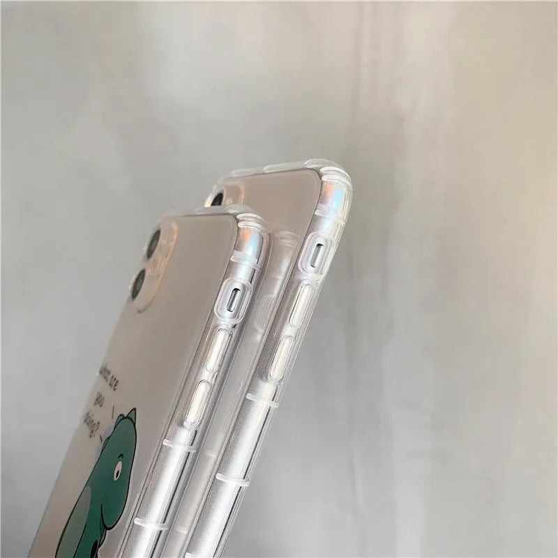 Transparent iPhone case with dinosaur couple design showing airbag anti-fall protection