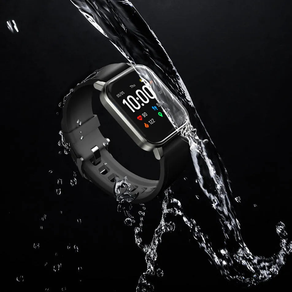Black waterproof smart bracelet with 1.4-inch screen and silicone strap on a wrist.
