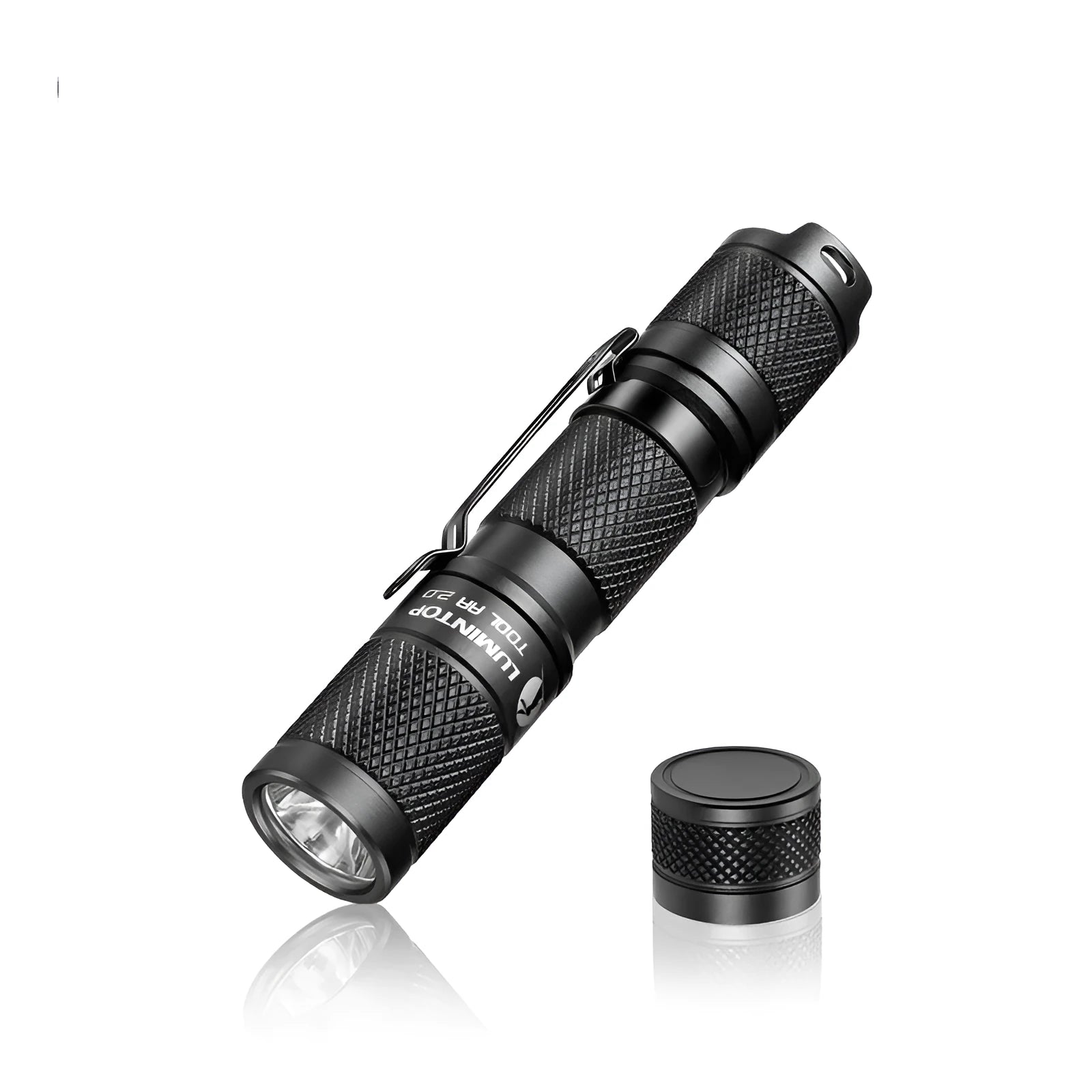 Black Lumintop Tool AA2.0 compact keychain flashlight with magnetic tail cap on a keyring.