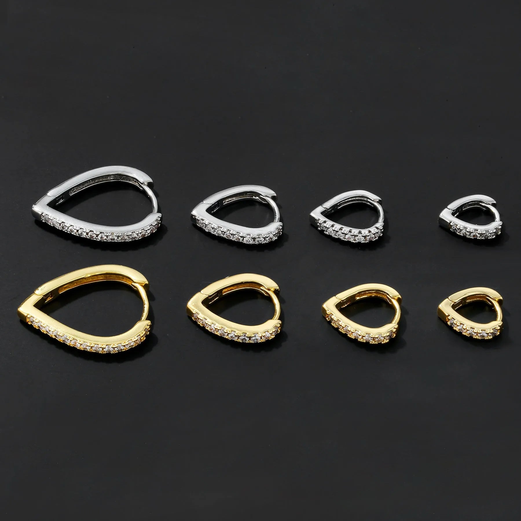 Gold geometric heart-shaped copper clip-on earring for women.
