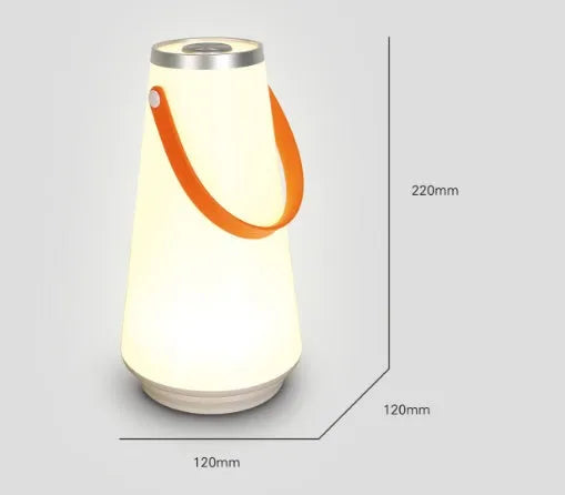 White rechargeable LED night light with touch controls measuring 12x12x22cm