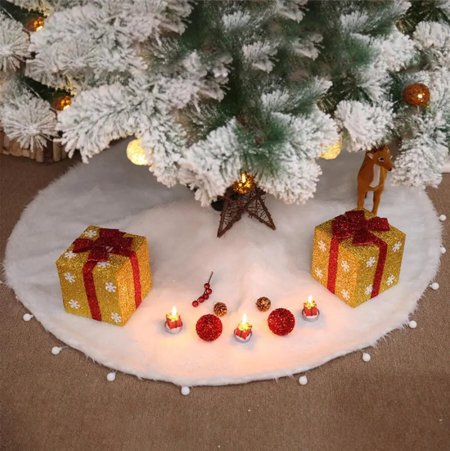 White plush Christmas tree skirt placed around base of decorated Christmas tree, 122cm size