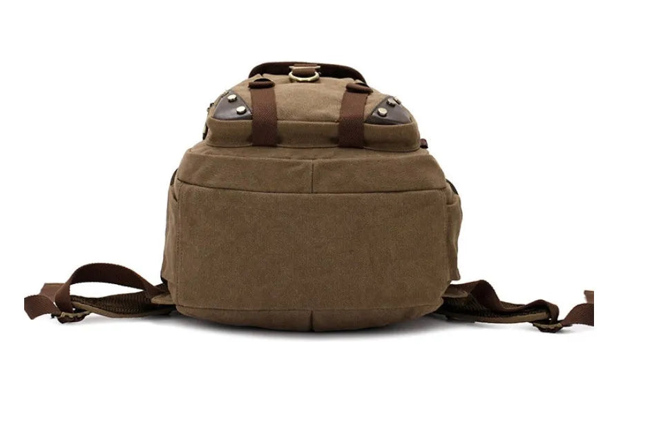 Large canvas travel backpack with air cushion strap in black, 20-35L capacity, front pocket visible
