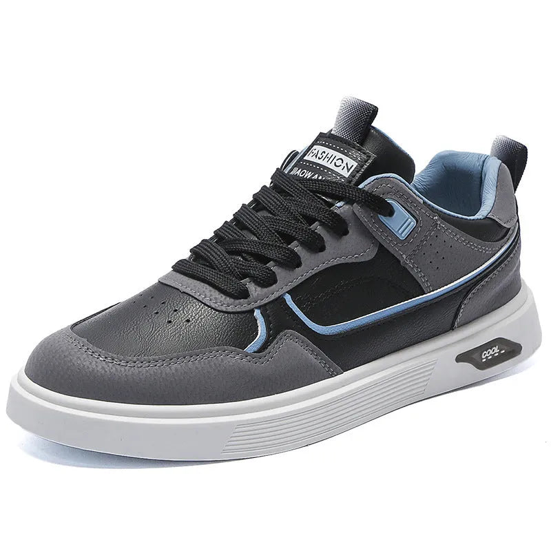 Men's low-top canvas board shoes in grey with leather stitching and mesh lining visible at the collar.