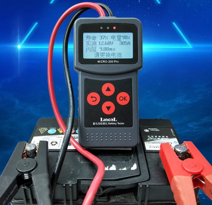 Black car battery tester with display and cables, measuring 15x6x3 cm