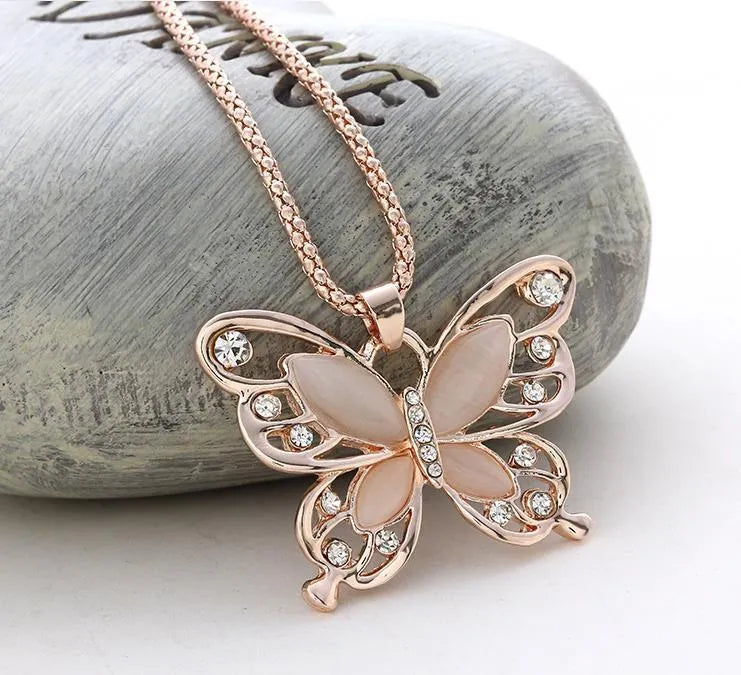 Butterfly Spirit Necklace with alloy pendant, snake bone chain, and gold or rose colour options