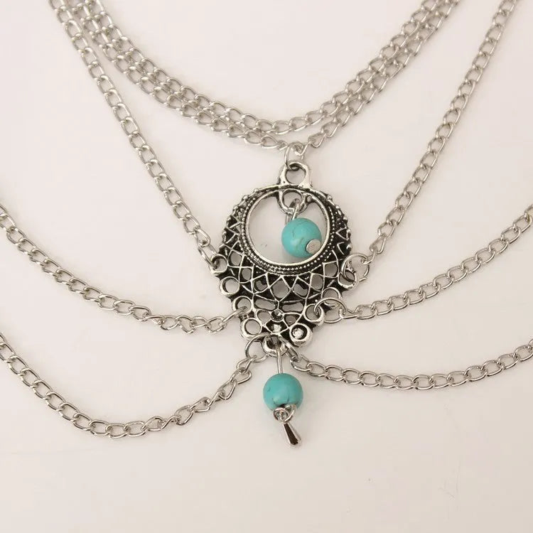 Bohemian chain anklet in Ancient Silver, 21 cm length, 2.3 cm width, on a plain background