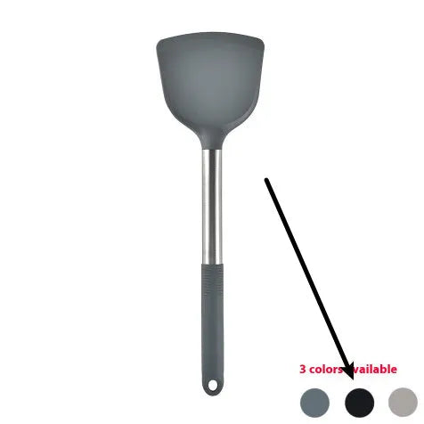 12-piece black silicone kitchen utensil set with tools stored in a rotating countertop storage bucket