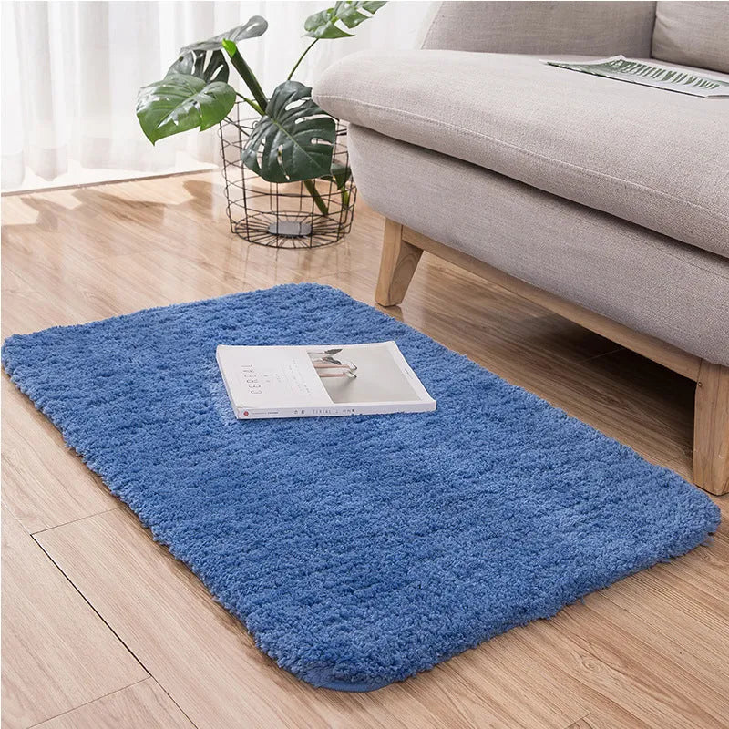Square absorbent non-slip polyester floor mat in solid colour, available in 12 colours and 4 sizes for bathroom or kitchen.