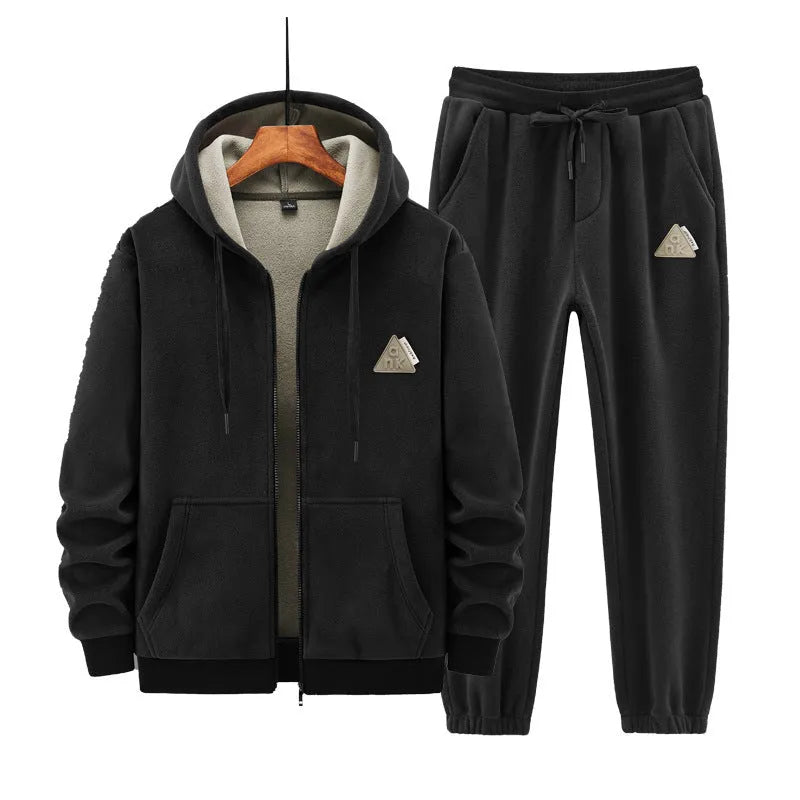 Grey cashmere-blend hooded sweater and matching trousers laid flat as a casual sports suit set.